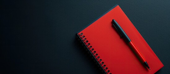 Aufkleber - Empty open notebook with a red pen on a black table top view Desk organizer Spiral notepad on a clear desk flat lay. with copy space image. Place for adding text or design