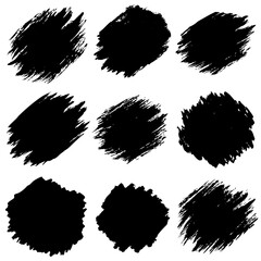 A collection of black brush strokes on a stark white background