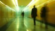 © Maria Mikhaylichenko - Blurred silhouettes of commuters walking through a bright yellow-green illuminated tunnel, creating an ethereal and dynamic urban scene of motion and light.