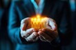 © Worrapol - Empowering the Future: A close-up shot of a business leader's hands cradling a glowing digital representation of a diverse team, symbolizing the power of human connection and collaboration in a modern