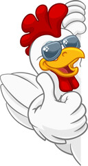 Sticker - A chicken rooster cockerel bird cartoon character in cool shades or sunglasses peeking around a sign and giving a thumbs up