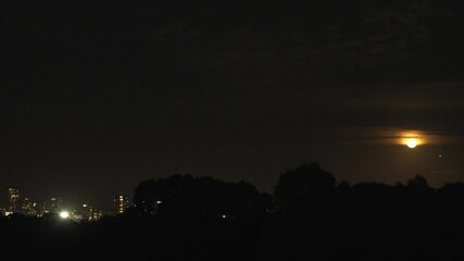 Wall Mural - Timelapse of the moon rising in Sydney, Australia