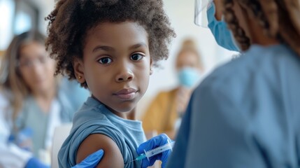 Wall Mural - A child receiving a vaccine shot in the arm at a clinic