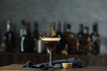 Poster - Refreshing cocktail, spoon and coffee beans on wooden table