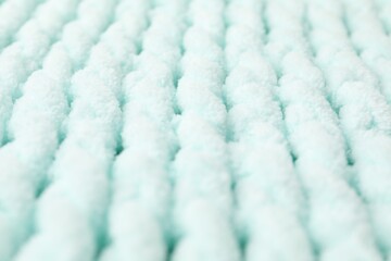 Poster - Texture of light blue knitted fabric as background, closeup