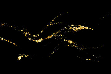 Wall Mural - Scattered golden particles on dark background. Holiday background or design element. New Year and Christmas