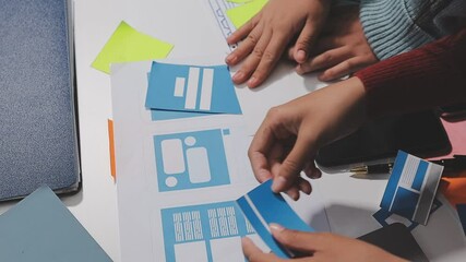 The designer team is designing the uxui system to make the uxui system work well on new phones and support system updates. Website development concept UI UX front end designer