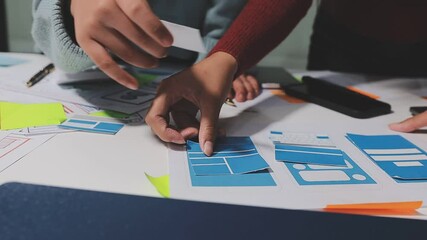 The designer team is designing the uxui system to make the uxui system work well on new phones and support system updates. Website development concept UI UX front end designer