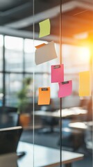 Poster - Sticky notes on a glass partition in a modern office with sunlight. Creative ideas and organization for business planning.