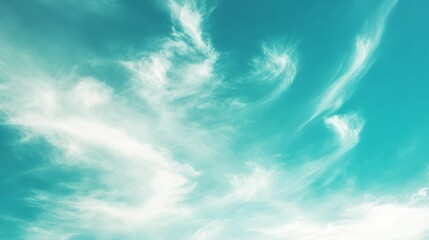 Poster - Soft focus green and blue sky with wispy clouds