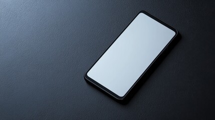Poster - Top view of a smartphone with a blank screen placed on a plain surface, highlighting the device's sleek design