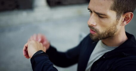 Sticker - Sports, watch and young man in the city training for running marathon, race or competition. Fitness, health and male athlete runner with cardio workout or exercise to start with time in town street.