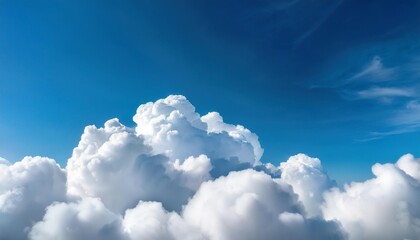 Wall Mural - white heap clouds in the blue sky