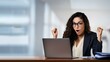 © Сергій Колесніков - Surprised manager or freelancer, wow, success, career. Young businesswoman with shocked excited expression looking at laptop.