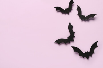 Wall Mural - Paper bats for Halloween party on lilac background