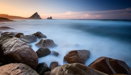 long exposure sea and rocks at twilight