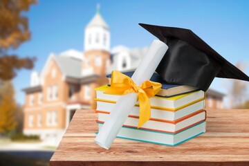 Wall Mural - Graduate college, black university cap and diploma