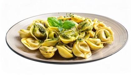 delicious plate of tortellini with pesto sauce isolated on a transparent background