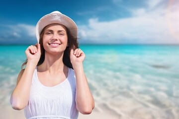 Beautiful Young happy woman on the beach.