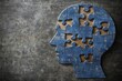 © Leo Rohmann - Monochrome portrait of a human head with disintegrating puzzle pieces symbolizing the breakdown of thoughts mental fragmentation and the struggle with identity