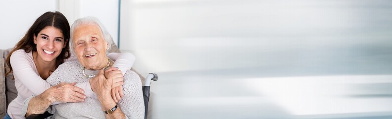 Two Women Embracing Each Other At Home