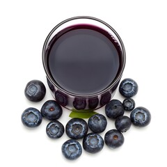 Poster - Closeup of a glass filled with vibrant blueberry juice placed at the center of a clean minimalist white background