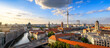the skyline of berlin in the evening sun