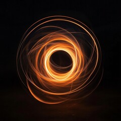 Aufkleber - Orange light trails form a captivating swirling circular pattern on a dark background, evoking a sense of dynamism and energy, and symbolizing artistic creativity.