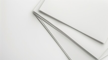 Aufkleber - A stack of white papers sitting on a table, great for office or study setting