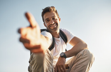 Canvas Print - Man, pov and hand in portrait for hiking, help and support for adventure, fitness and travel on vacation. Person, guide or coach with open palm for climbing, trekking or outdoor on holiday in Greece