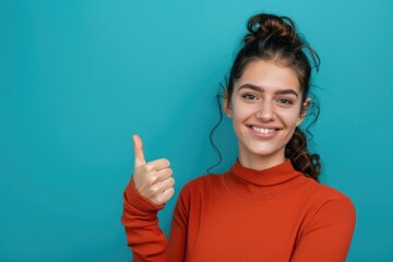 Poster - A person wearing an orange sweater gives a thumbs up, possibly expressing positivity or approval