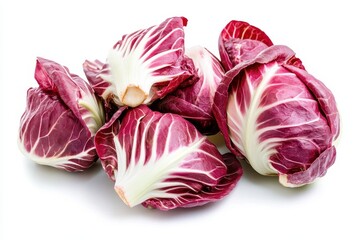 Wall Mural - A cluster of red cabbage leaves arranged on a white background.