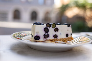 dessert with blueberries on a cafe terrace in summer