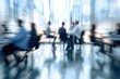 © alisaaa - An office is built on teamwork Blurred shot of a group of businesspeople working together in a modern office