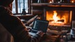 © Neuropixel - Remote working. A person sitting at home in front of a fireplace