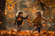 © Ирина Щукина - Two children playing in the fall, one in a yellow jacket