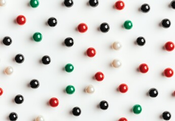 Top view of colored pepper grains and flakes with a white background