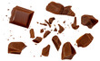 © nataliazakharova -  Levitating dark chocolate chunks isolated on white background. Broken chocolate bar pieces and cocoa crumbs explotion. Chocolate flakes and  chips Top view. Flat lay..