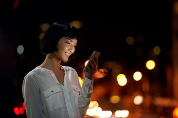 Poster - Phone, night and happy business woman in city for info, research story or news on deadline. Mobile, scroll or employee check email, update or reading notification for project with journalist on bokeh