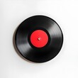 © thanarak - Classic Vinyl Record on White Background with Distinct Grooves and Vibrant Red Label