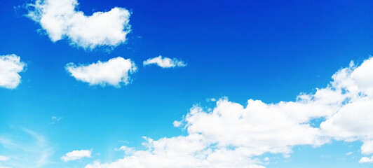 Summer blue sky cloud gradient clear white background. Calm bright winter weather background with beauty clear clouds in sunlight. Surrounding gloomy vibrant cyan landscape day horizon silhouette view