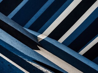 Diagonal stripes in deep blue creating an abstract visual effect