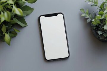 Fototapete - Mockup of a smartphone placed on a table surrounded by small green plants in a modern setting