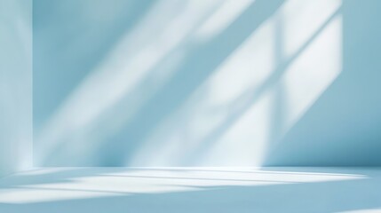 Poster - A minimalist studio backdrop featuring a soft blue and white gradient with natural window light casting shadows on the floor and wall. It symbolizes simplicity, serenity, and a clean, modern aesthetic