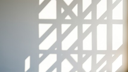 Poster - geometric shadows on a white wall from sunlight streaming through a window 