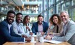 © Q STOCK - Diverse group of smiling businesspeople discussing work together while sitting around a meeting table in an office complex
