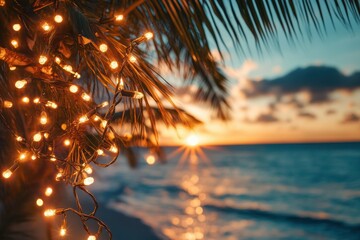 Vibrant white Christmas lights illuminate a palm tree, creating a warm glow against the backdrop of the ocean and clear blue sky, enhancing the festive atmosphere