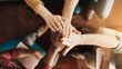 © Sanc/peopleimages.com - Hands together, business and above in workshop, teamwork and collaboration for meeting, success or achievement. Group of people, cooperation and unity for workplace, synergy or positive as colleagues