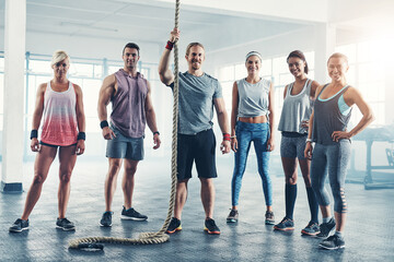 Canvas Print - People, portrait and rope for fitness in gym, team and trainer in class for workout training. Group, coach and exercise together for bodybuilding strength, friends and support in balance challenge