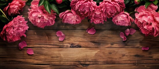 Canvas Print - Vibrant pink peonies Stunning peonies against a wooden backdrop. Copy space image. Place for adding text and design